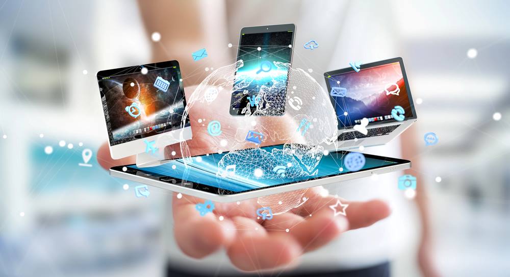 Businessman connecting tech devices in a 3D rendering, featuring 411 Business Law, highlighting Adapting to Emerging Technologies and IP Trends, and aligning with the page's context.