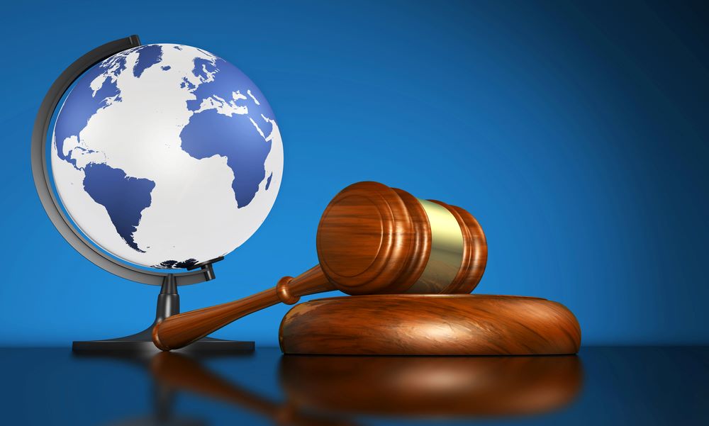 Image representing global justice and international law, featuring 411 Business Law and highlighting 'Navigating Multiple Legal Systems,' ensuring it aligns with the page's context.