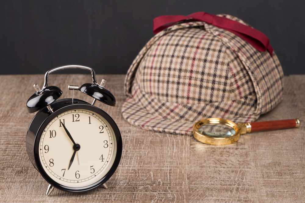 Image of a Sherlock Holmes hat and a magnifying glass, representing investigative themes, featuring 411 Business Law and highlighting 'Private Placements,' ensuring it aligns with the page's context.